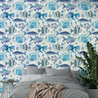 Fun wallpaper design with tropical sea creatures on a blue base.

