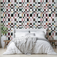 Soft checkered wallpaper with artistic watercolor brush strokes.

