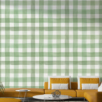 Watercolor wallpaper with relaxed green gingham checks.

