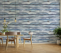 Modern striped wallpaper with soft blue tones and artistic texture.

