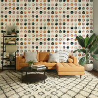 Soft dot wallpaper with hand-painted terracotta shapes.

