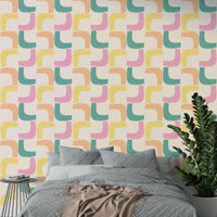 Wallpaper with vibrant pastel boomerang patterns for a retro look.

