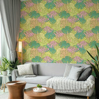 Palm Springs-inspired wallpaper with pastel Monstera and tropical foliage.

