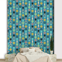 Bold geometric shapes in retro colors on a rich blue backdrop.

