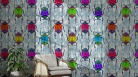 Rainbow Bugs wallpaper on soft blue background

