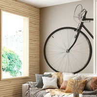 Kids’ room with playful bicycle wallpaper

