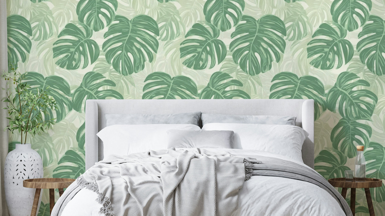 Monstera Moments Wallpaper featuring vibrant monstera leaves.

