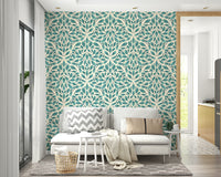 Leaf pattern wall covering in muted teal tones

