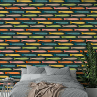 Multicolored anchovies on a charcoal background for fun decor.

