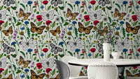 Wildflowers and butterflies wallpaper in soft pastel colors

