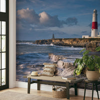 Red and white lighthouse mural wallpaper for a nautical-inspired room.


