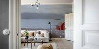Coastal cabin wall mural for bringing the beauty of nature indoors.

