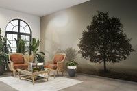 Solitary tree and expansive landscape captured in a wall mural.

