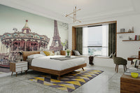Vintage carousel and Eiffel Tower mural for a magical space.

