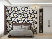 Bold daisy print wallpaper with a dark background

