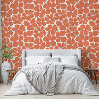 Contemporary floral wallpaper in coral and blush tones

