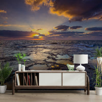Peaceful coastal scene captured at golden hour in a wall mural design.

