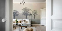 Leafless trees in fog wall mural for serene spaces

