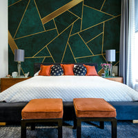 Dark teal and gold mosaic wall mural with abstract shapes

