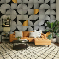 Mid-century concrete and gold wall mural with geometric design

