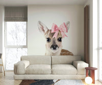 Serene deer with a bow wall mural for tranquil rooms.


