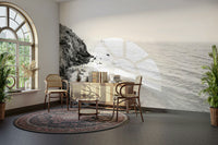 Serene coastal scenery in black and white mural design.

