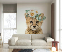 Charming floral cheetah cub mural for a lively space

