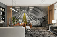 Vibrant yellow escalator steps in subway mural design

