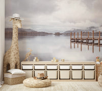 Scenic lake pier wall mural with autumn foliage in the background.

