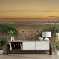 Warm sunset mural with beach pathway and natural elements.

