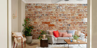 Wall mural showing aged brickwork with soft details

