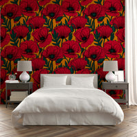 Bright red poppies on orange wallpaper design


