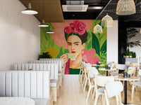 Vibrant mural of woman surrounded by tropical flora

