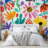 Oversized cut-out flowers in vibrant mural design

