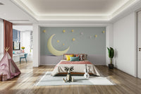 Close‑up of moon and clouds in nursery wallpaper design


