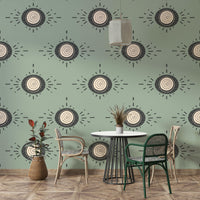 Bold geometric floral wallpaper with sage background and charcoal flowers

