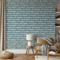 Coastal wallpaper with soft blue and green tones featuring fish motifs

