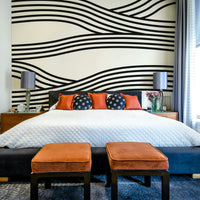 Stylish monochrome wall mural with wavy rhythmic patterns.

