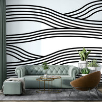 Abstract monochrome wave patterns in a rhythmic flow.

