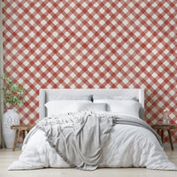 Red festive gingham wallpaper creating a warm, cheerful atmosphere

