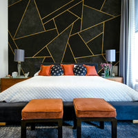 Artistic black mosaic mural creating a striking focal point


