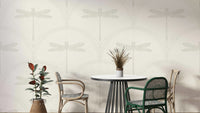 Art Deco-inspired dragonfly wallpaper with metallic accents

