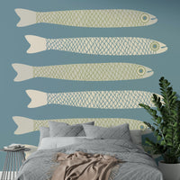 Cream and sage fish on light blue
