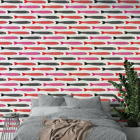 Red pink black fish on white background
