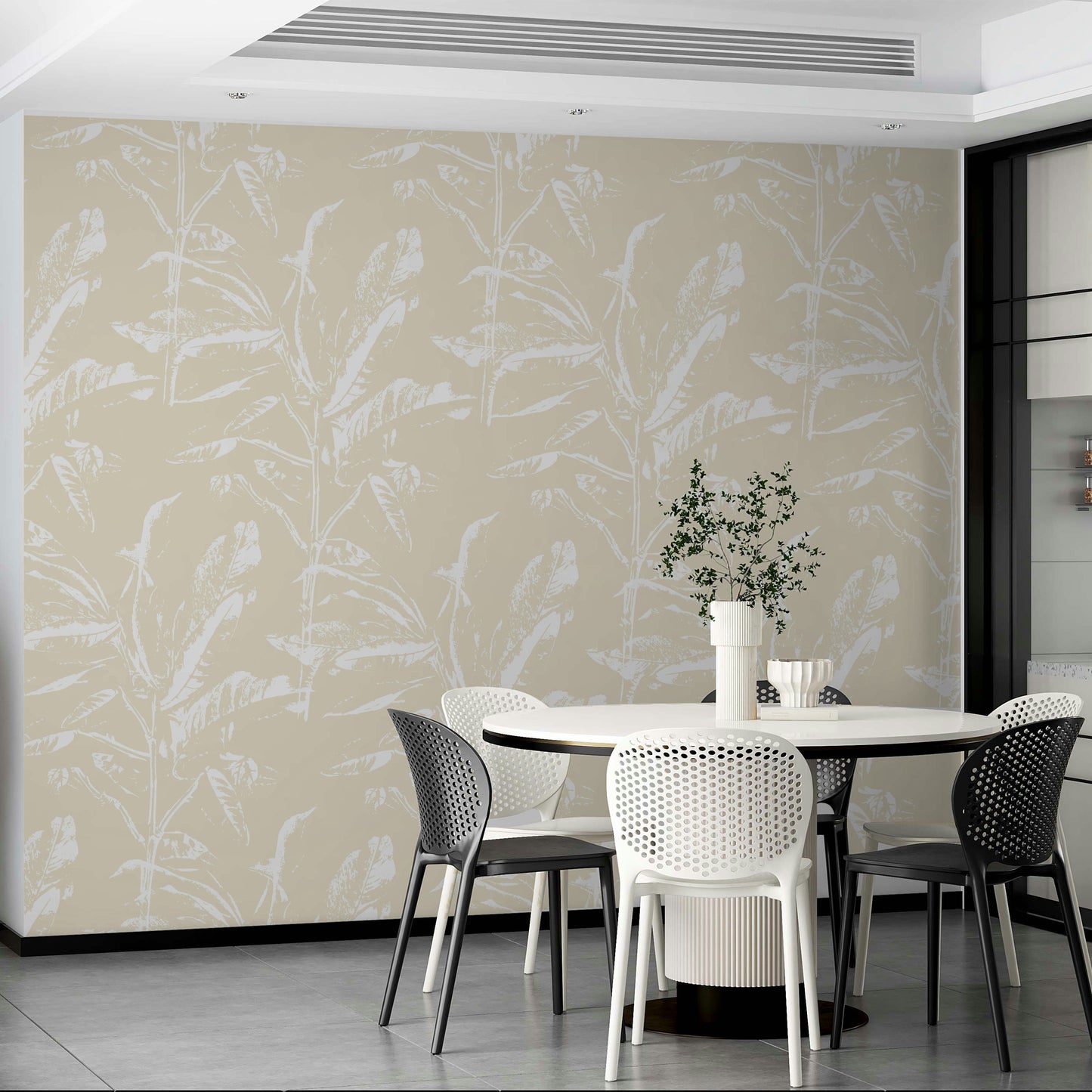 Soft yellow mural wallpaper with leaf patterns

