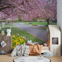 Colorful garden and tree-lined path wallpaper

