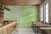 Relaxing green palm leaf wallpaper design

