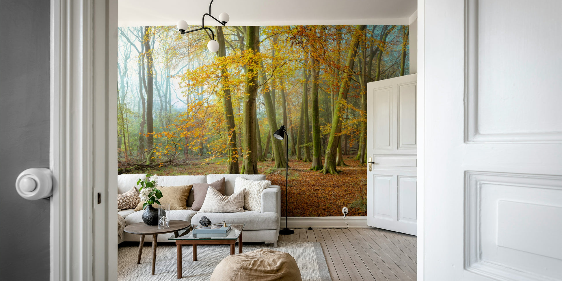 A wall mural depicting a dreamy woodland
