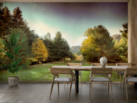 The image shows a path covered in fallen leaves in a tranquil setting.

