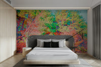 The colors are rich oranges, yellows, and reds against a soft blue sky.

